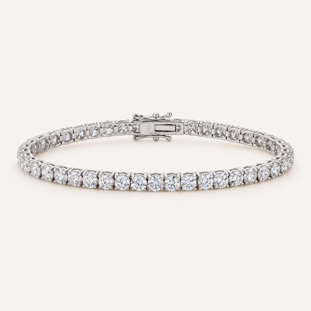 Diamond tennis bracelet in white gold on an ivory background