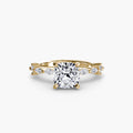 Solitaire with Eternity Pavé engagement ring in yellow gold with a cushion-cut centre stone