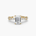 Solitaire with Eternity Pavé engagement ring in yellow gold with an emerald-cut centre stone