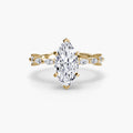 Solitaire with Eternity Pavé engagement ring in yellow gold with a marquise centre stone
