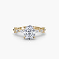 Solitaire with Eternity Pavé engagement ring in yellow gold with an oval centre stone