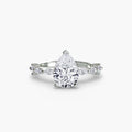 Solitaire with Eternity Pavé engagement ring in white gold with a pear-shaped centre stone