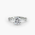 Solitaire with Eternity Pavé engagement ring in white gold with a round centre stone