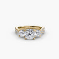 Three-Stone with Pavé Band engagement ring in yellow gold with a cushion-cut centre stone