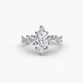 Three-Stone with Pavé Band engagement ring in white gold with a marquise centre stone
