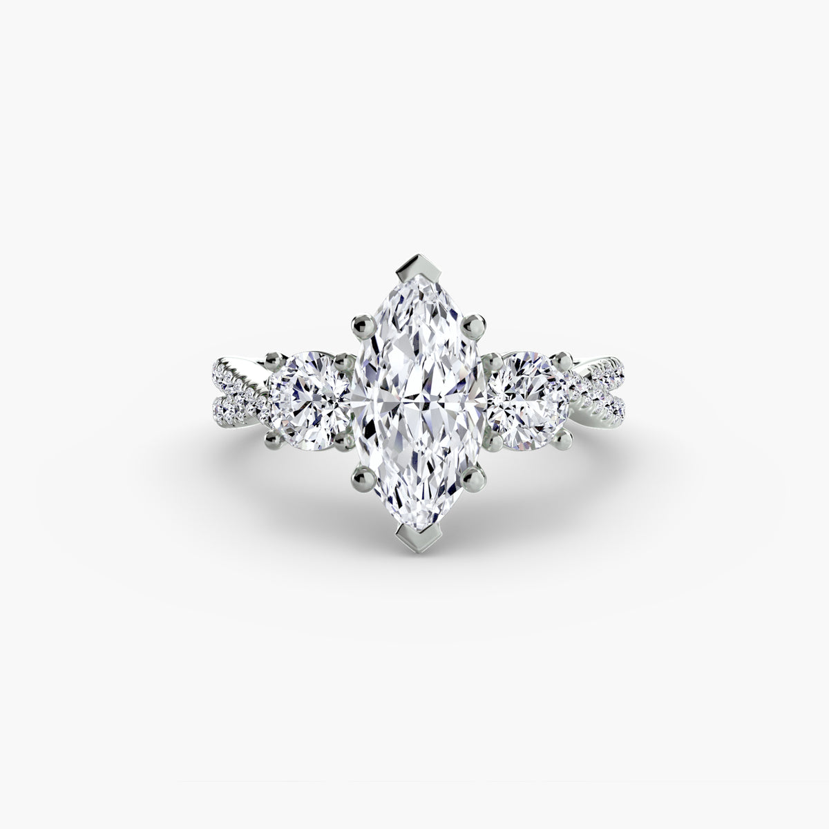 Three-Stone with Pavé Band engagement ring in white gold with a marquise centre stone