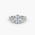 Three-Stone with Pavé Band engagement ring in white gold with an oval centre stone