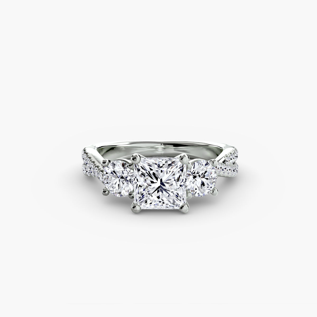 Three-Stone with Pavé Band engagement ring in white gold with a princess-cut centre stone
