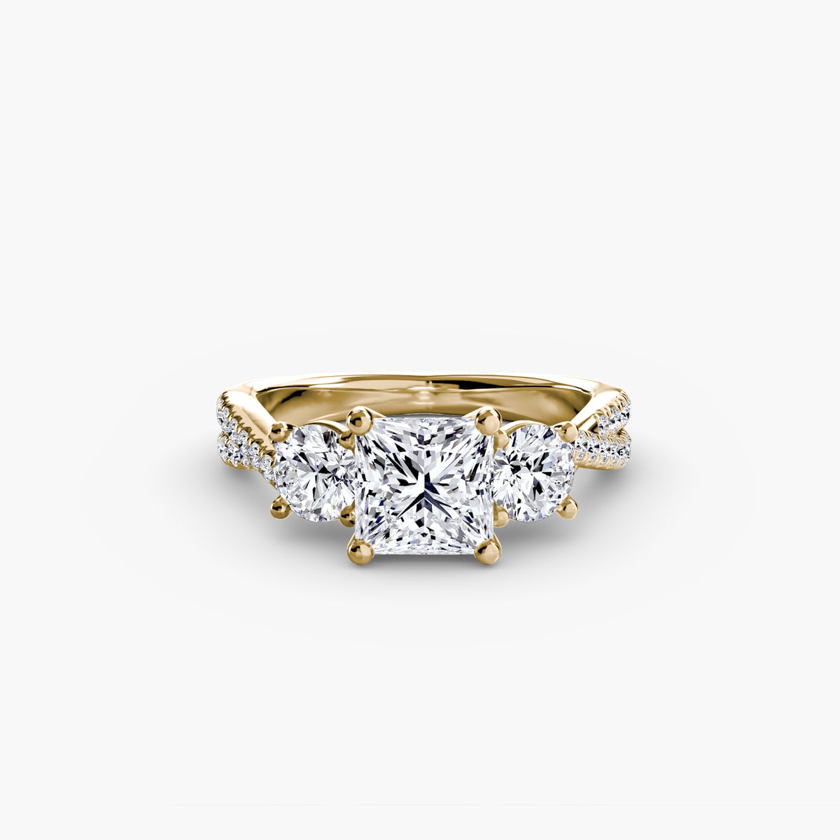 Three-Stone with Pavé Band engagement ring in yellow gold with a princess-cut centre stone