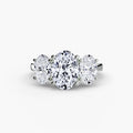 Trilogy Oval engagement ring in white gold with an oval centre stone