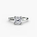 Solitaire ring in white gold with a cushion-cut centre stone