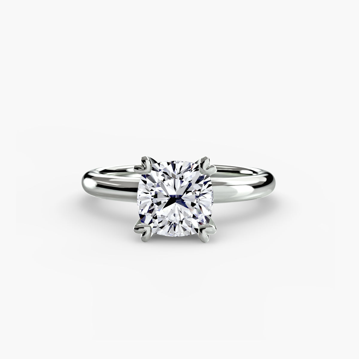 Solitaire ring in white gold with a cushion-cut centre stone