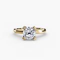 Solitaire ring in yellow gold with a cushion-cut centre stone