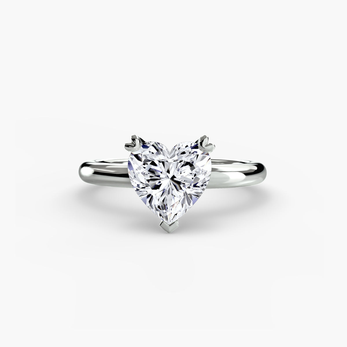 Solitaire ring in white gold with a heart-shaped centre stone