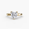 Solitaire ring in yellow gold with a heart-shaped centre stone