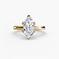 Solitaire ring in yellow gold with a marquise centre stone