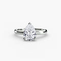 Solitaire ring in white gold with a pear-shaped centre stone