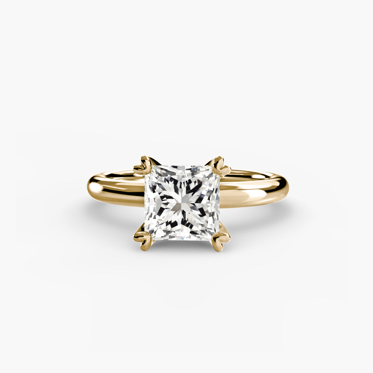Solitaire ring in yellow gold with a princess-cut centre stone