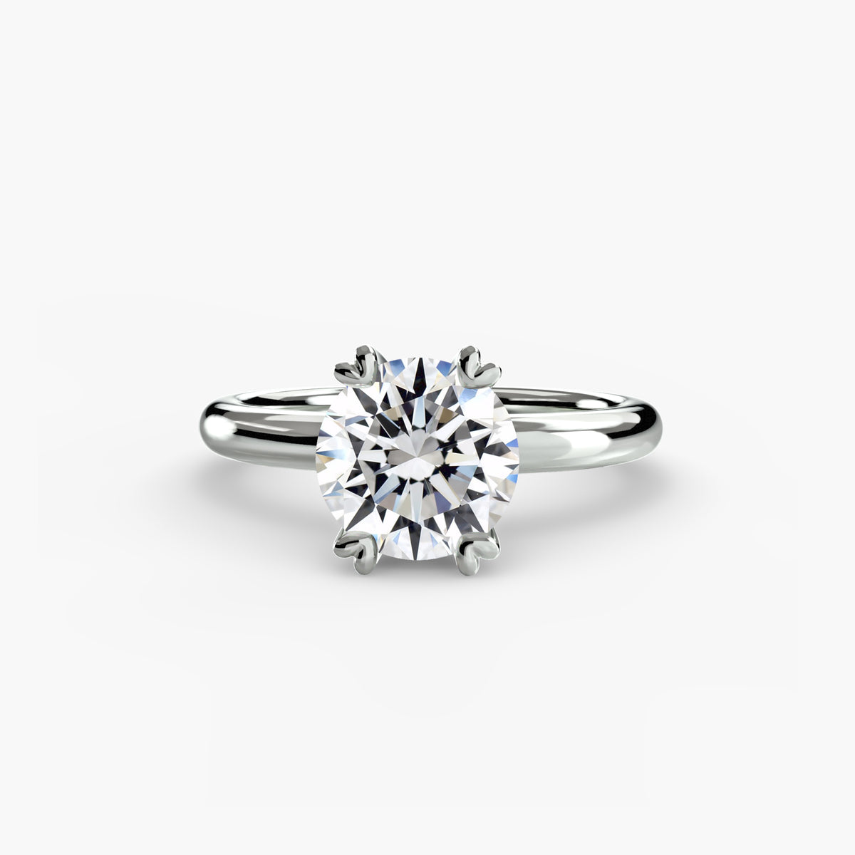 Solitaire ring in white gold with a round centre stone