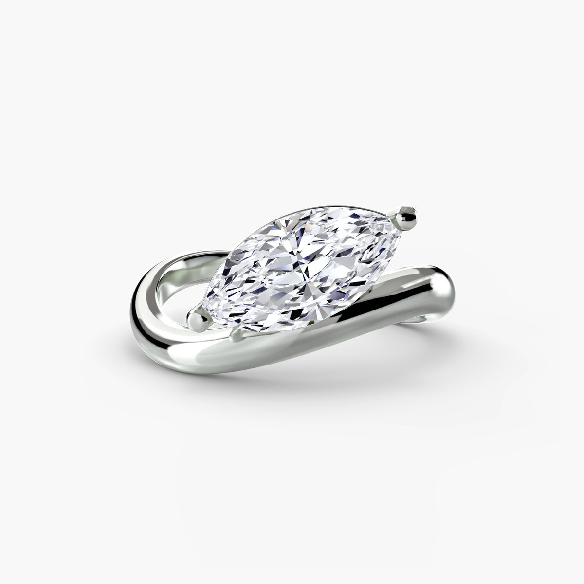 The Wave Ring in white gold with a marquise centre stone