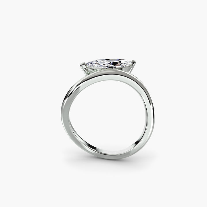 The Wave Ring in white gold with a marquise centre stone, front view