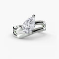 The Wave Ring in white gold with a pear-shaped centre stone