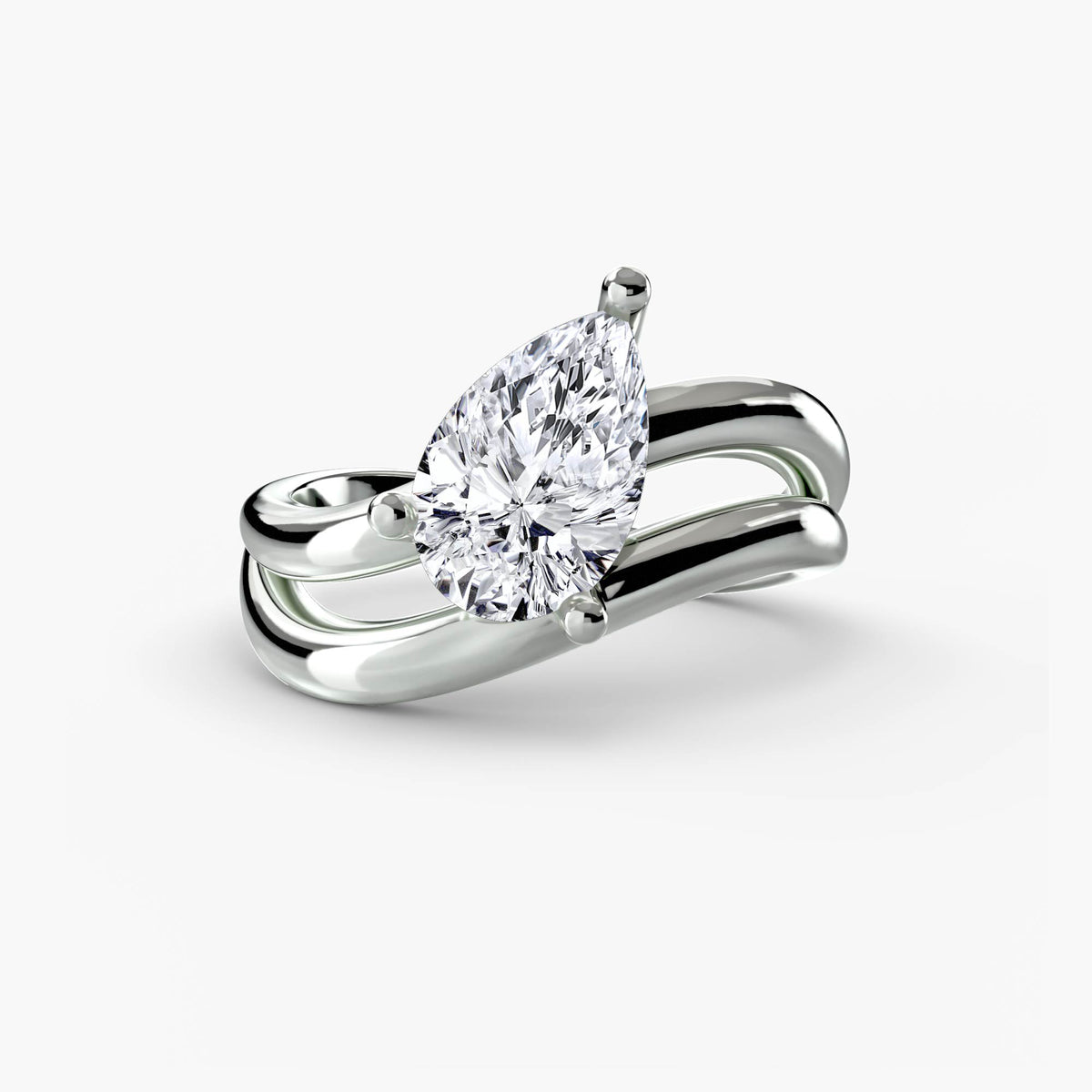 The Wave Ring in white gold with a pear-shaped centre stone