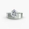 Wide Band Solitaire engagement ring in white gold with a round centre stone