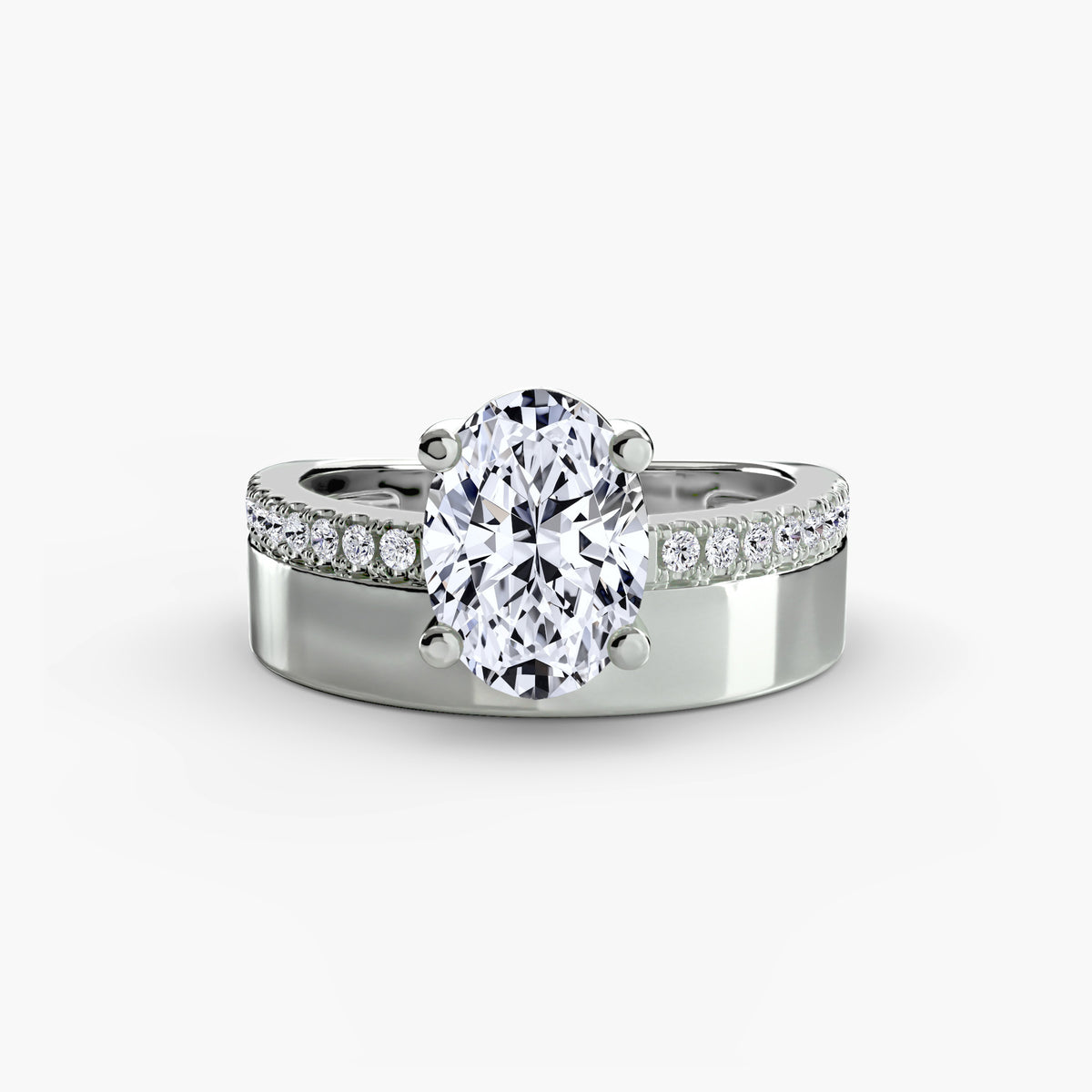 Wide Band Solitaire with Pavé Band engagement ring in white gold with an oval centre stone