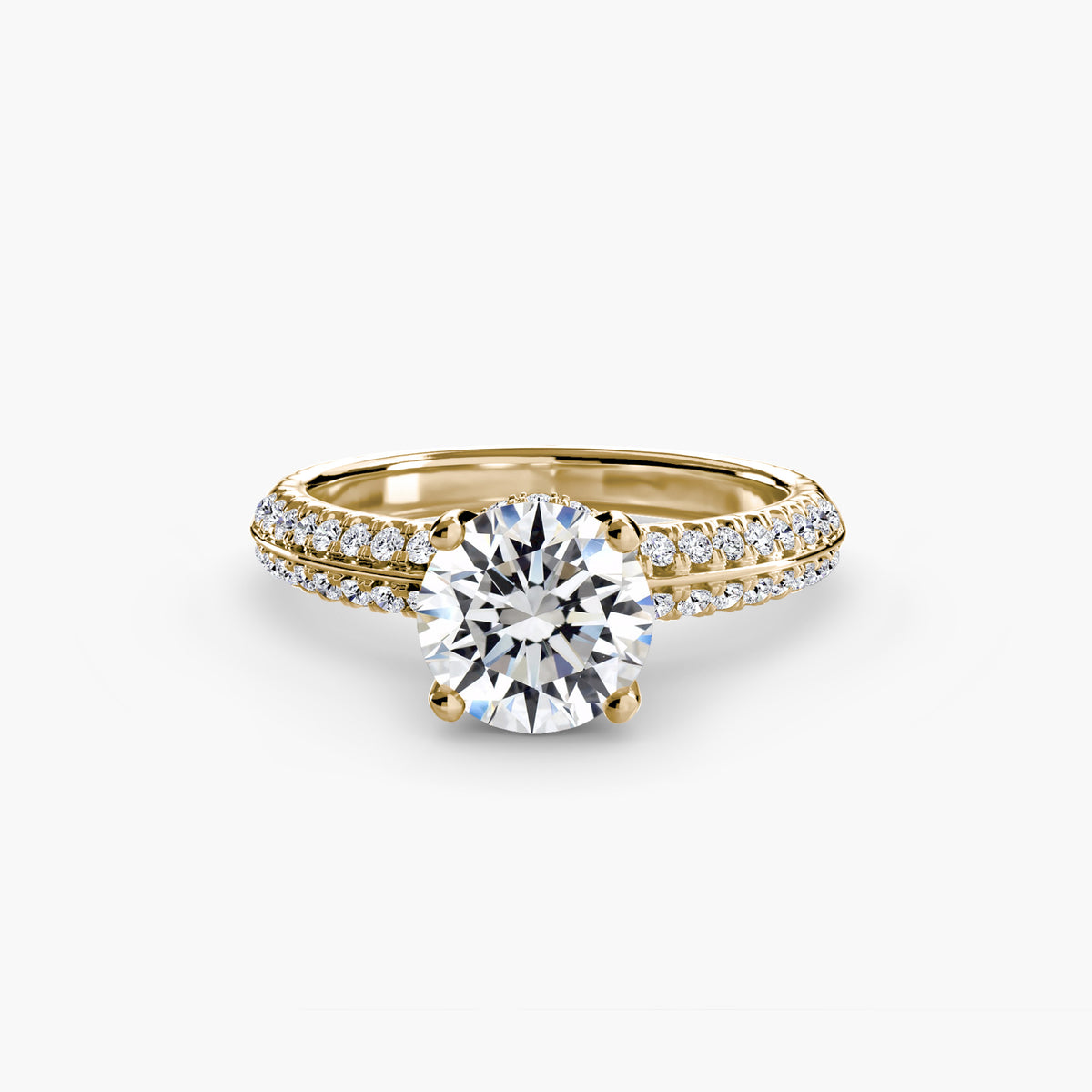 Solitaire with Pavé engagement ring in yellow gold with a round centre stone