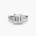 Solitaire with Pavé engagement ring in white gold with an emerald-cut centre stone