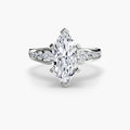 Solitaire with Pavé engagement ring in white gold with a marquise centre stone