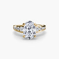 Solitaire with Pavé engagement ring in yellow gold with an oval centre stone