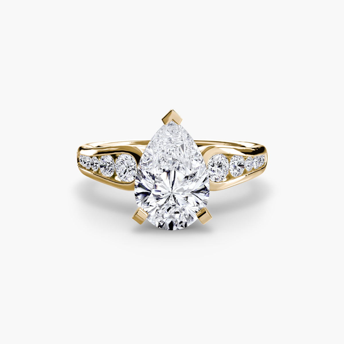 Solitaire with Pavé engagement ring in yellow gold with a pear-shaped centre stone
