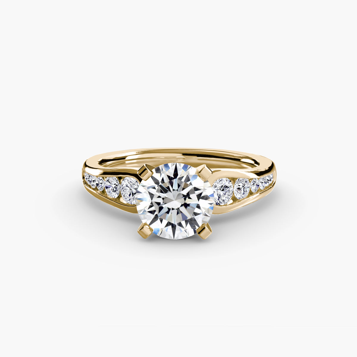Solitaire with Pavé engagement ring in yellow gold with a round centre stone