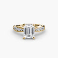 Solitaire with Pavé engagement ring in yellow gold with an emerald-cut centre stone