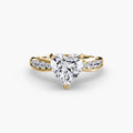 Solitaire with Pavé engagement ring in yellow gold with a heart-shaped centre stone
