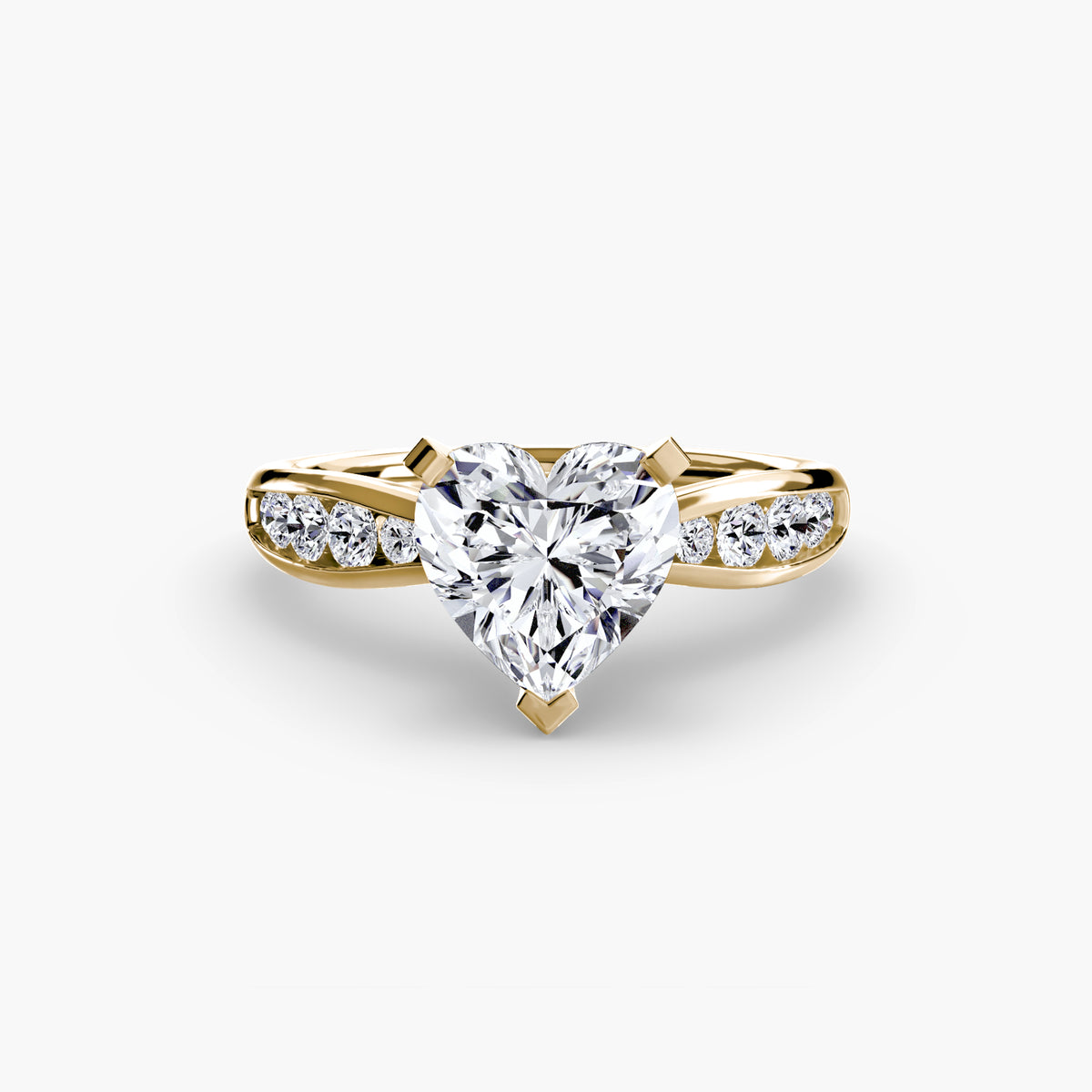 Solitaire with Pavé engagement ring in yellow gold with a heart-shaped centre stone