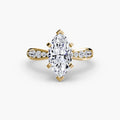 Solitaire with Pavé engagement ring in yellow gold with a marquise centre stone