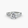 Solitaire with Pavé engagement ring in white gold