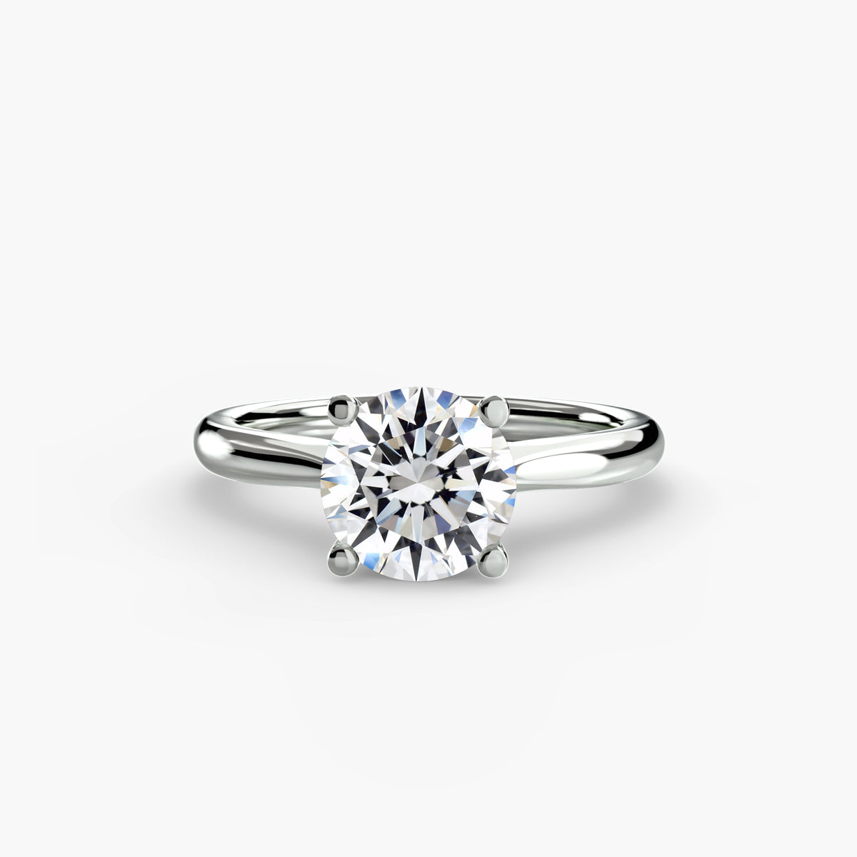 Solitaire ring in white gold with a round centre stone