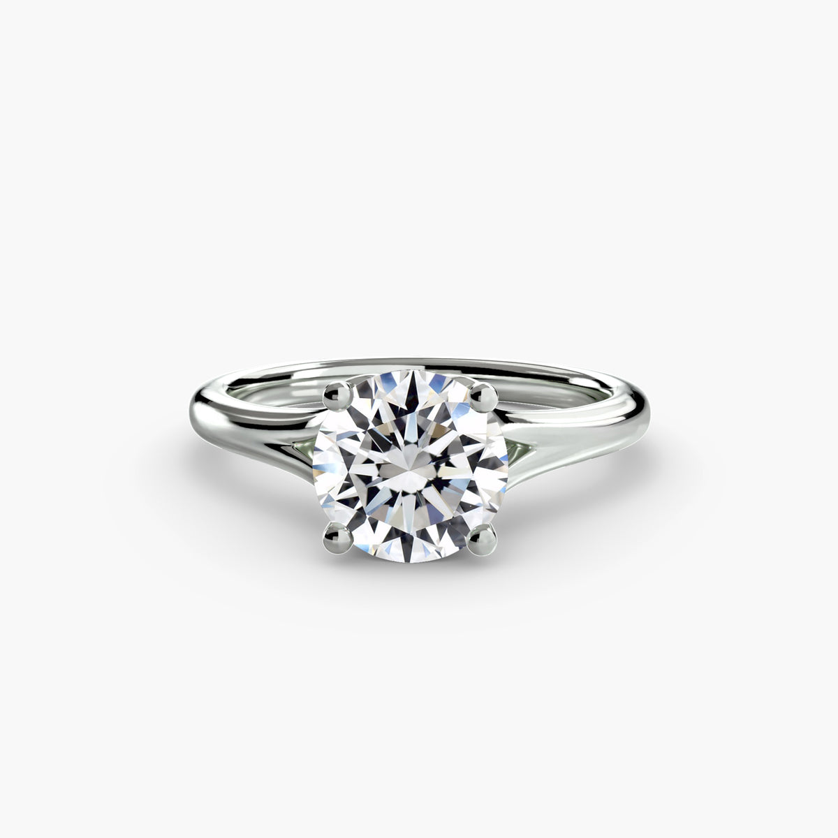Solitaire ring in white gold with a round centre stone