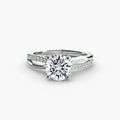 The Split Shank Pavé Solitaire engagement ring in white gold with a round centre stone