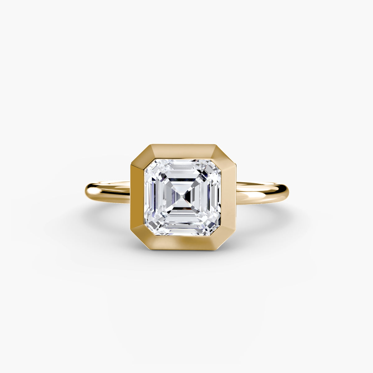 The Bezel Set Solitaire engagement ring in yellow gold with an Asscher-cut centre stone