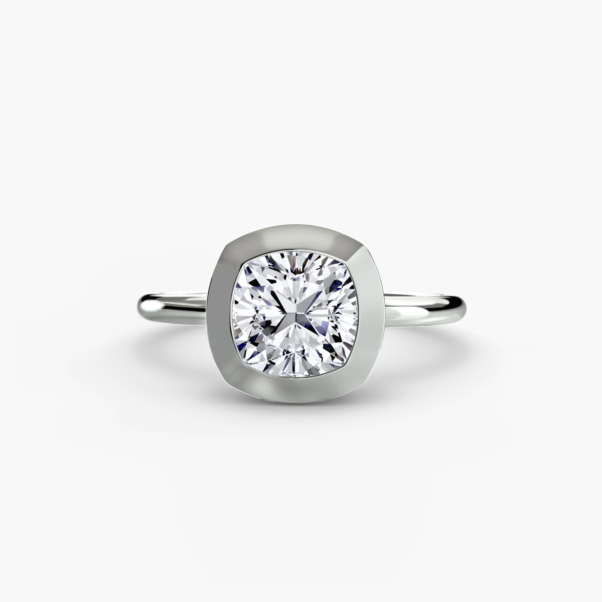 The Bezel Set Solitaire engagement ring in white gold with a cushion-cut centre stone