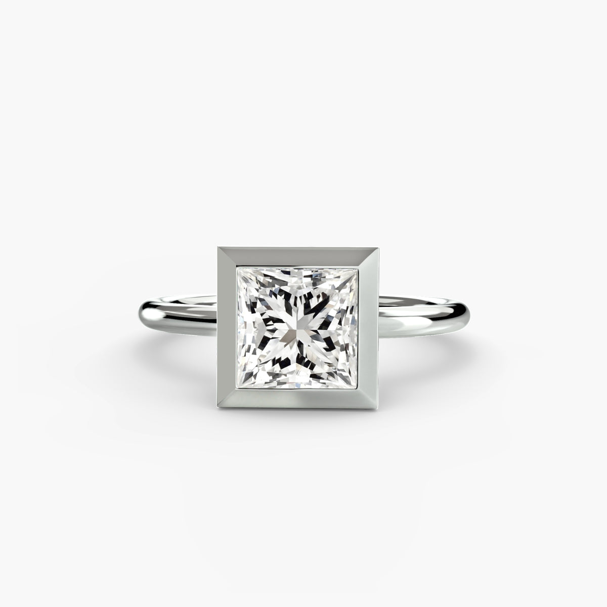 The Bezel Set Solitaire engagement ring in white gold with a princess-cut centre stone