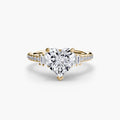 Solitaire with Pavé engagement ring in yellow gold with a heart-shaped centre stone