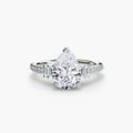 Solitaire with Pavé engagement ring in white gold with a pear-shaped centre stone