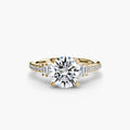 Solitaire with Pavé engagement ring in yellow gold with a round centre stone