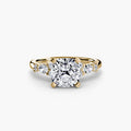 The Floral Accent Solitaire engagement ring in yellow gold with a cushion-cut centre stone
